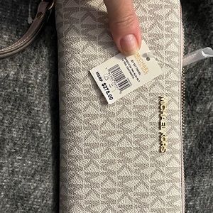 Michael Kors wristlet wallet new with tag
